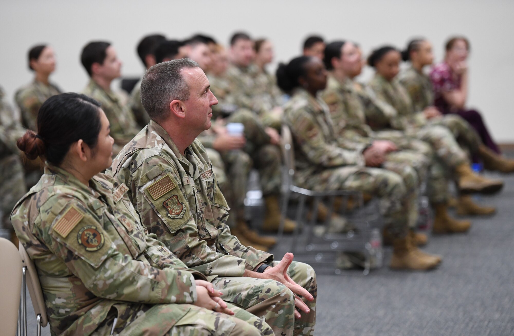 Keesler leadership and personnel attend the Women's History Month Diversity and Inclusion Panel inside the Roberts Consolidated Aircraft Maintenance Facility at Keesler Air Force Base, Mississippi, March 10, 2023.