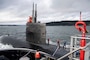 Sailors work aboard the Los Angeles-class fast-attack submarine USS Chicago (SSN 721) as the vessel transits the Puget Sound to its new homeport of Naval Base Kitsap-Bremerton, Washington, Jan. 17, 2023. Chicago, the fourth U.S. Navy ship to be named for the Illinois city, is scheduled to begin the inactivation and decommissioning process at Puget Sound Naval Shipyard after 36 years of service. (U.S. Navy photo by Mass Communication Seaman Sophia H. Brooks)