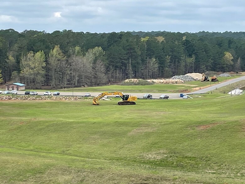 Prepositioned construction equipment for rip-rap repairs.