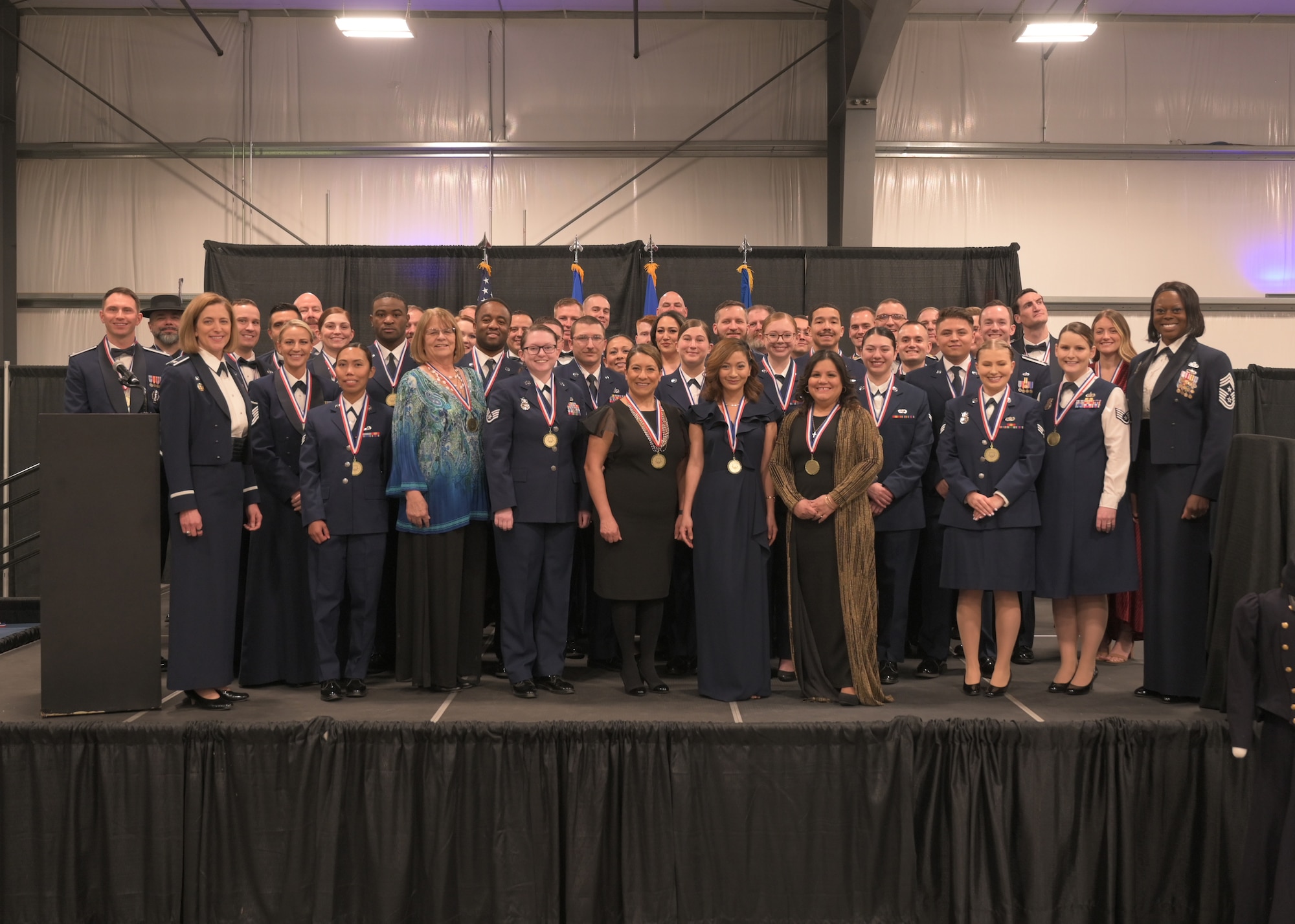 All nominees for the 2022 annual awards pose for a group photo at the Archer Event Center in Cheyenne, Wyoming, March 10, 2022. The annual awards serve as a way for the Air Force to recognize those members who have gone above and beyond thier duties. (U.S. Air Force photo by Senior Airman Darius Frazier.)