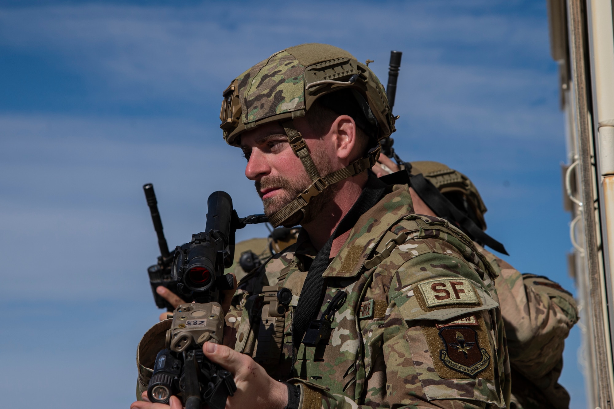 U.S. Air Force Senior Airman Robert Krumplitsch, 49th Security Forces Squadron patrolman, scans the area in an urban operations exercise during the first-ever-ever Fire Team Leaders Course at Holloman Air Force Base, New Mexico, Feb. 28, 2023. The FTLC course allowed Airmen to learn the basics of breaching entryways with specialized equipment along with the foundational steps to effectively conduct close-quarters combat. (U.S. Air Force photo by Senior Airman Antonio Salfran)