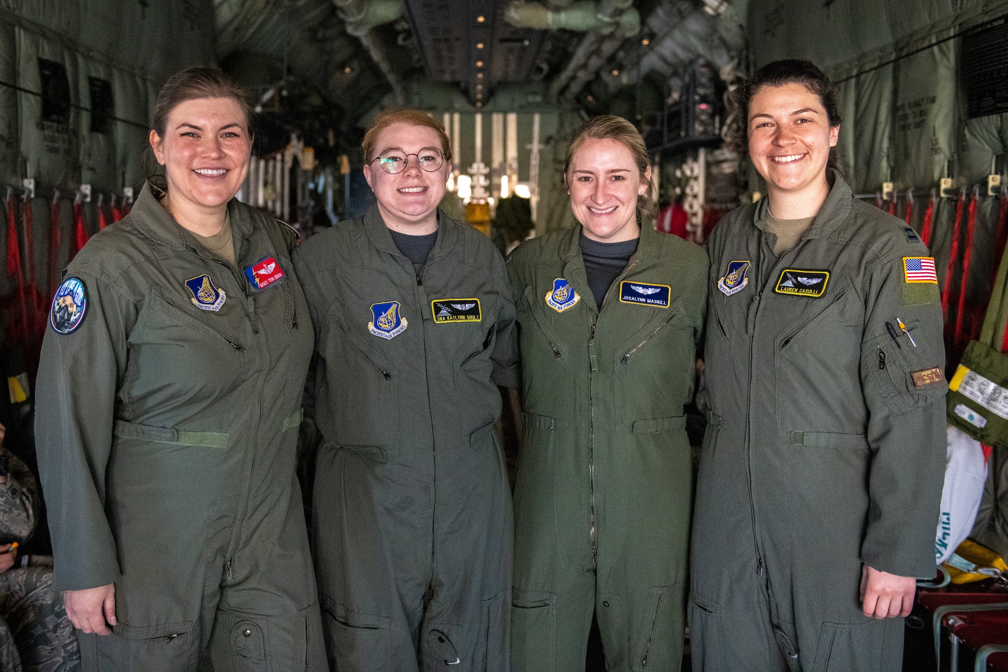 Female aviators of the 36th Airlift Squadron pose for a photo during an annual ‘Fly Girls’ aviation event.