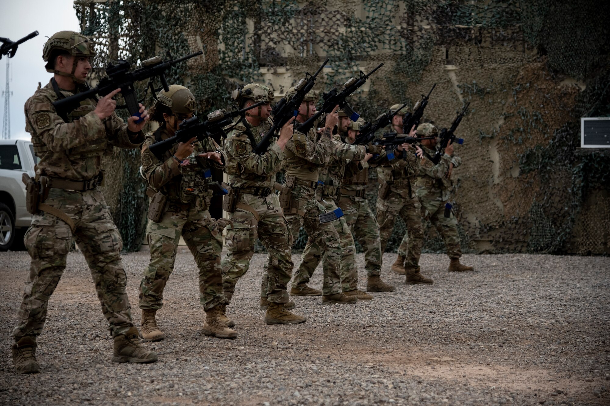 Airmen from the 49th Security Forces Squadron practice weapon reloading fundamentals during the first-ever-ever Fire Team Leaders Course at Holloman Air Force Base, New Mexico, Feb. 25, 2023. The course placed heavy emphasis on small-arms marksmanship fundamentals, mission planning, operations in urban environments, small unit tactics, and the overall ability to shoot, move and communicate. (U.S. Air Force photo by Senior Airman Antonio Salfran)