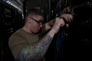 6th CS and the 38th Cyberspace Engineering Squadron worked together to upgrade MacDill’s network health. (U.S. Air Force photo by Airman 1st Class Derrick Bole)