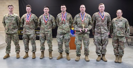 Members of the New Hampshire National Guard’s biathlon team pose for a photo after winning third place in the 2023 Chief of the National Guard Bureau’s Biathlon Championships at the Camp Ethan Allen Training Site in Jericho, Vt., Feb. 22. From left, U.S. Army Spc. Jimmy Small, U.S. Army 2nd Lt. Bryce Murdick, U.S. Army Spc. Tom Echelberger, U.S. Air Force Staff Sgt. Christopher Parent, U.S. Army Maj. Rob Burnham, U.S. Army Staff Sgt. Jacob Englehardt, U.S. Army Capt. Pamela Donley.