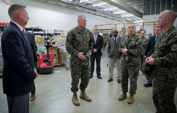 Lt. Gen. Edward D. Banta, deputy commandant, Installations and Logistics Division, took a tour of some facilities and assets at Marine Corps Logistics Base Albany, March 9. The tour included the barracks, Marine Corps Exchange, Commissary and Cpl. Dustin Jerome Lee Kennel. He also heard about upcoming projects including fuel and electric vehicle infrastructure expansions and improvements, and a future endurance course. (U.S. Marine Corps photo by Jennifer Parks)