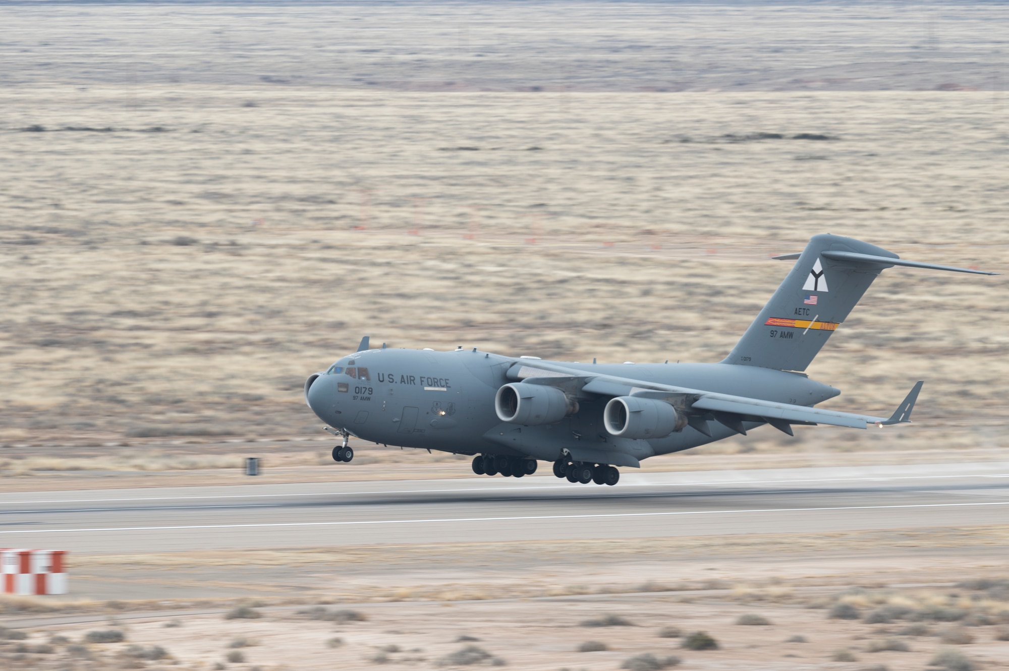 A C-17 Globemaster III assigned to the 97th Air Mobility Wing at Altus Air Force Base, Oklahoma, lands at Holloman AFB, New Mexico, March 2, 2023