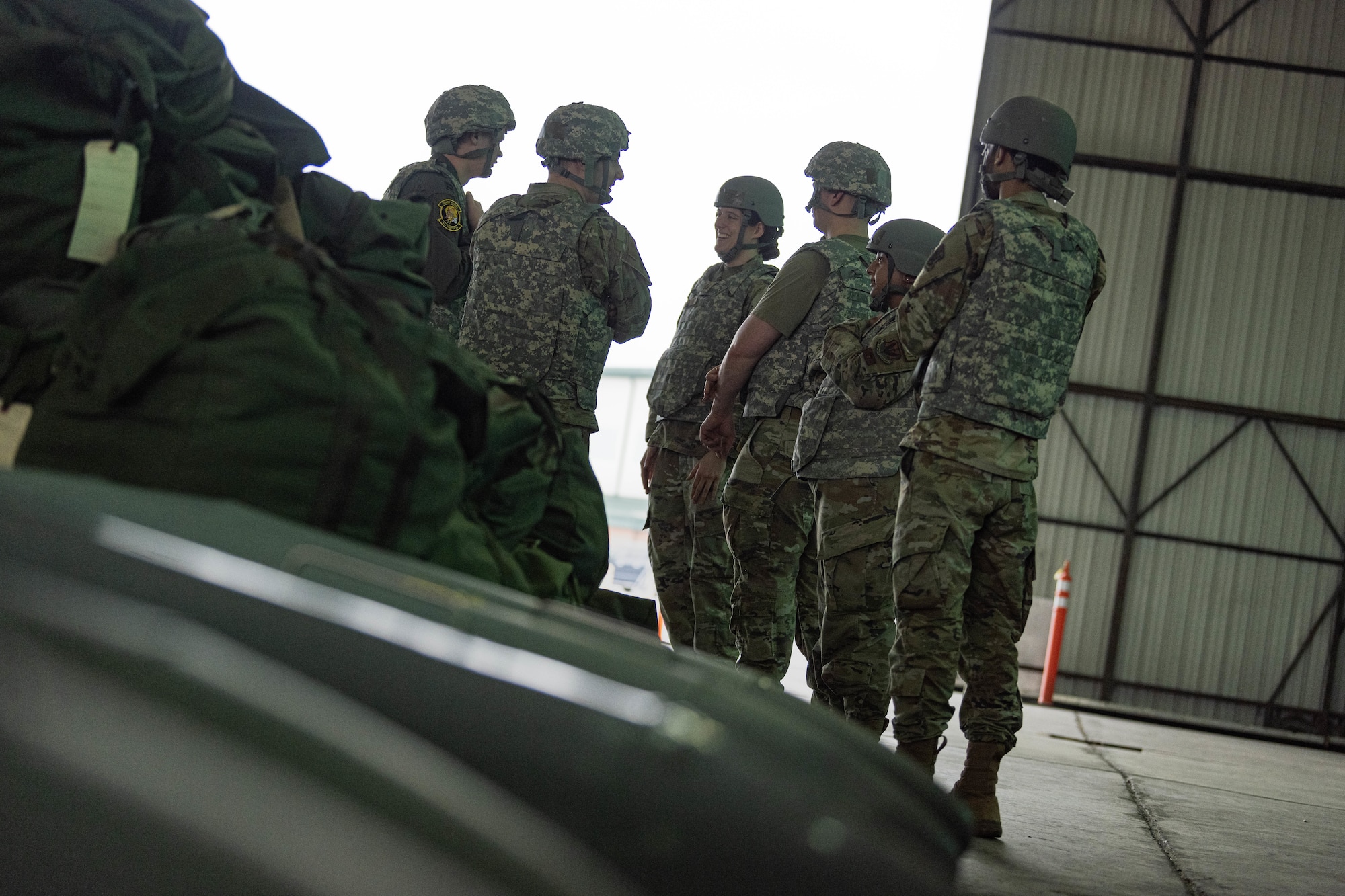 A photo of a group of Airmen preparing to launch jets.