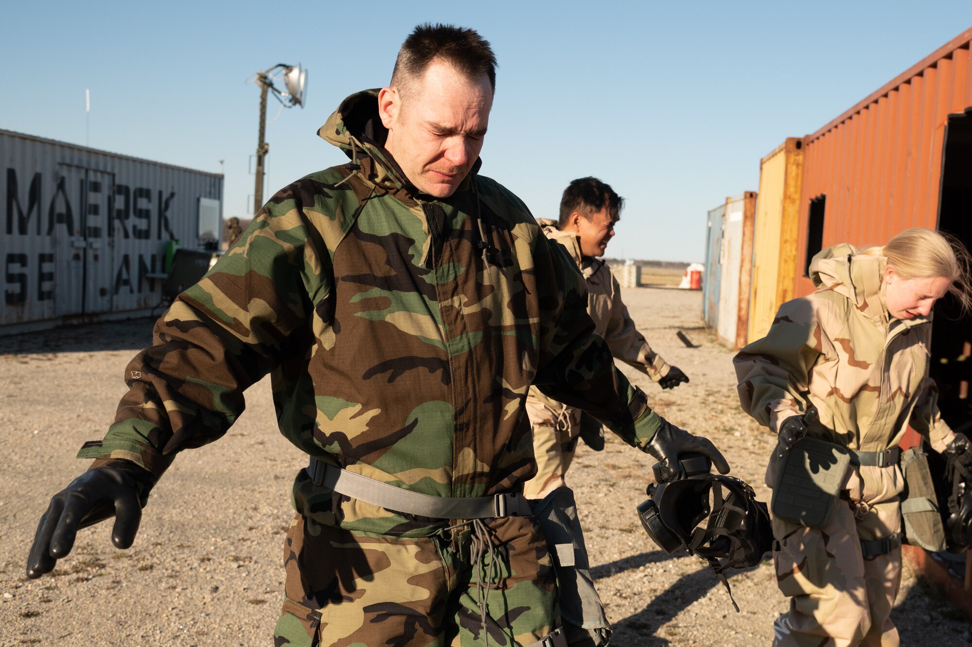 Airmen with the 436th Civil Engineer Squadron are exposed to tear gas in order to familiarize themselves with the use of a gas mask and the rest of their mission oriented protective posture gear during a readiness exercise at Dover Air Force Base, Delaware, March 7, 2023. The exercise tested the abilities of the 436th Airlift Wing to generate, employ and sustain airpower and to familiarize Airmen with the use of a gasmask. across the world in a contested and degraded operational environment. (U.S. Air Force photo by Mauricio Campino)