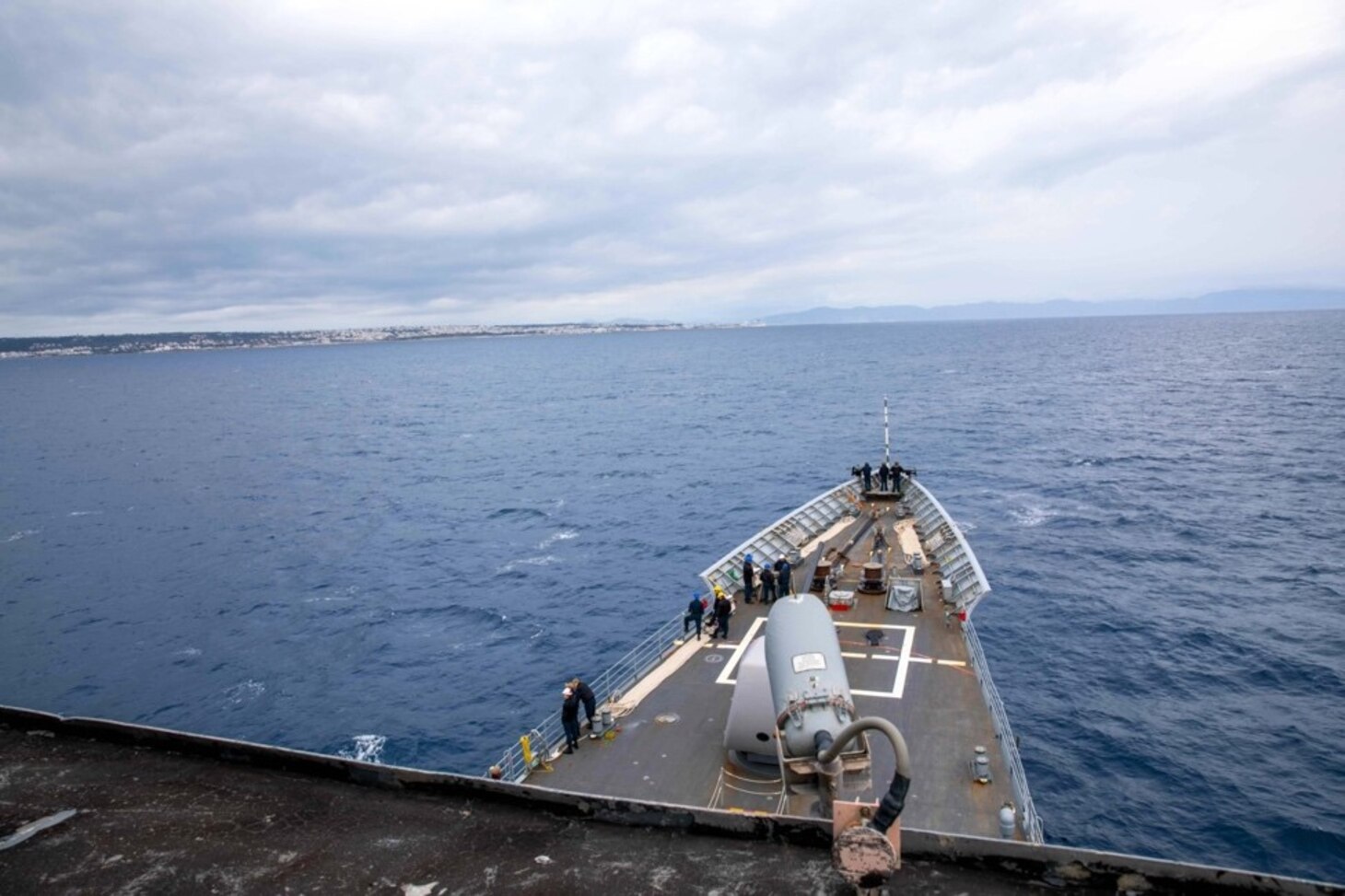 The Ticonderoga-class guided-missile cruiser USS Leyte Gulf (CG 55) arrives in Rhodes, Greece for a scheduled port visit, March 11, 2023. The George H.W. Bush Carrier Strike Group is on a scheduled deployment in the U.S. Naval Forces Europe area of operations, employed by U.S. Sixth Fleet to defend U.S., allied, and partner interests.