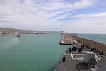 The Arleigh Burke-class guided-missile destroyer USS Delbert D. Black (DDG 119) arrives in Civitavecchia, Italy for a scheduled port visit, March 11, 2023. The George H.W. Bush Carrier Strike Group is on a scheduled deployment in the U.S. Naval Forces Europe area of operations, employed by U.S. Sixth Fleet to defend U.S., allied, and partner interests.