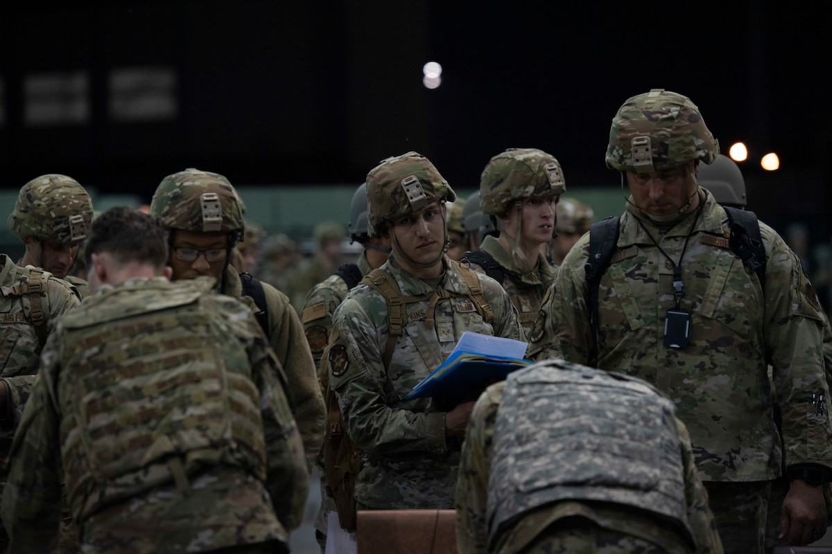 Members of the 366th Fighter Wing in-process for exercise Agile Flag 23-1, after landing at the Air Dominance Center, a combat readiness training center, in Savannah, Ga., Feb. 28, 2023. As the Lead Wing, the 366th FW commanded a mission generation force element from the 388th FW and integrated with mobility air assets to deliver combat air power all while operating from dispersed location with contested logistics in a dynamic environment. (U.S. Air Force photo by Tech. Sgt. Joshua Edwards)