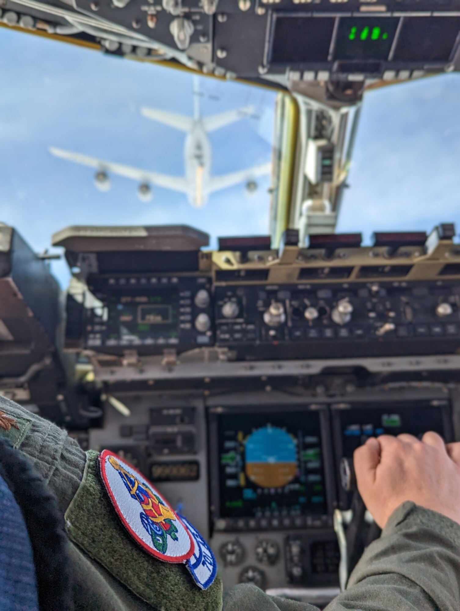 An Air Force Reserve C-17 Globemaster III aircrew, from Joint Base Charleston's 701st Airlift Squadron, refueled in mid-flight from the Kansas Air National Guard's 117th Air Refueling Squadron while flying westward over the Great Plains and Rocky Mountains, March 9, 2023. The Reserve aircrew trained on skills that couldn't easily be replicated locally at Charleston, such as flying over terrain, adverse weather, and aerial refueling including practicing emergency procedures. (U.S. Air Force photo by Tech. Sgt. Della Creech)