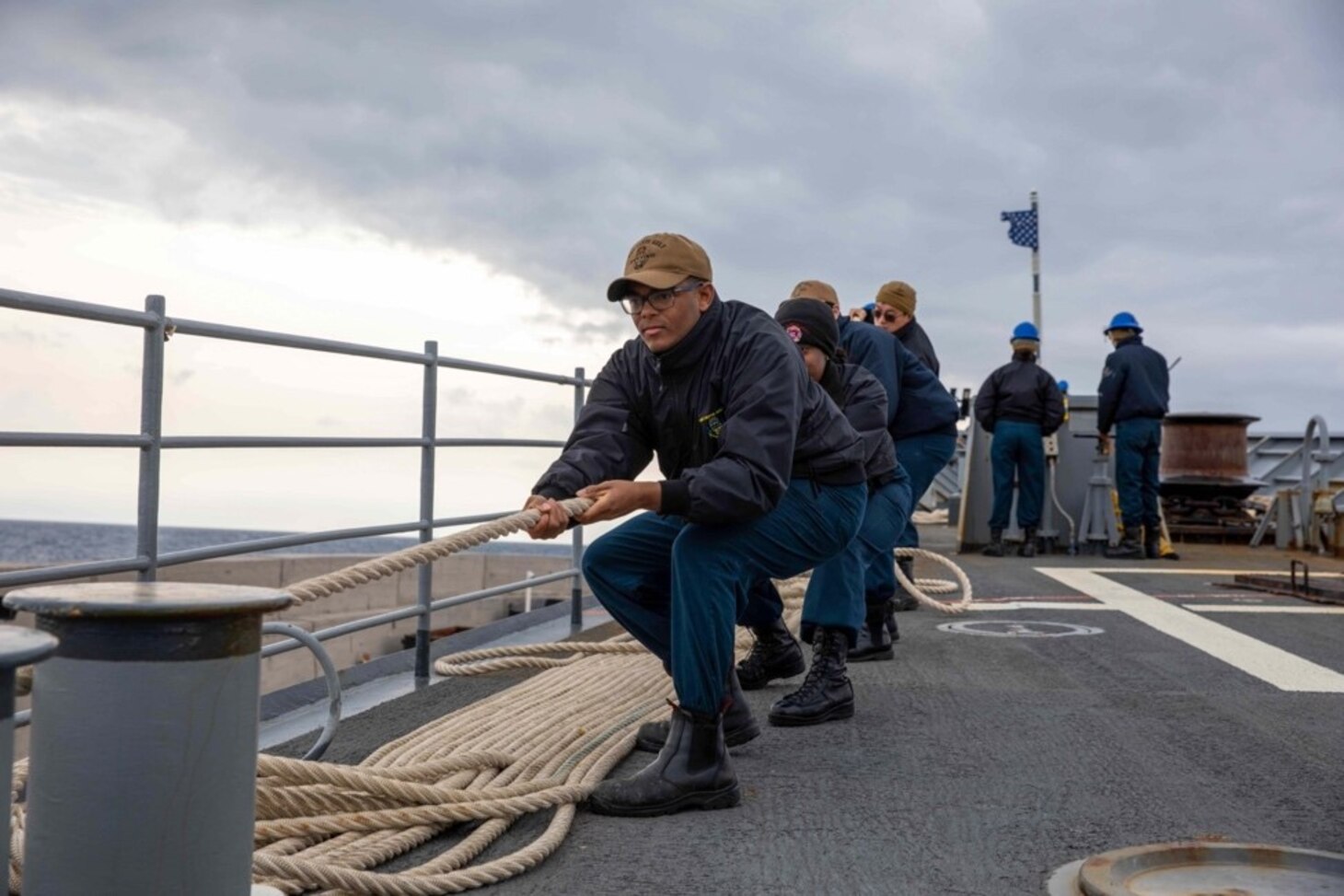 (March 11, 2023) Sailors assigned to the Ticonderoga-class guided-missile cruiser USS Leyte Gulf (CG 55), heave line as the ship arrives in Rhodes, Greece for a scheduled port visit, March 11, 2023. The George H.W. Bush Carrier Strike Group is on a scheduled deployment in the U.S. Naval Forces Europe area of operations, employed by U.S. Sixth Fleet to defend U.S., allied, and partner interests.