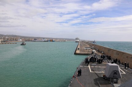 The Arleigh Burke-class guided-missile destroyer USS Delbert D. Black (DDG 119) arrives in Civitavecchia, Italy for a scheduled port visit, March 11, 2023. The George H.W. Bush Carrier Strike Group is on a scheduled deployment in the U.S. Naval Forces Europe area of operations, employed by U.S. Sixth Fleet to defend U.S., allied, and partner interests.