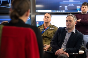Man listens to briefing