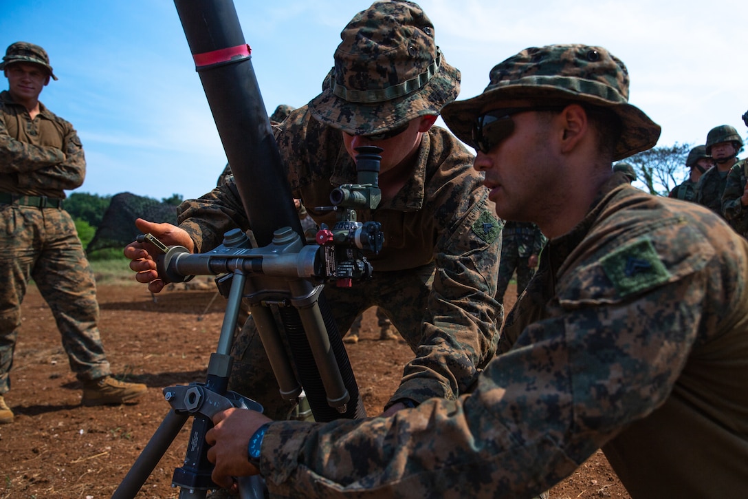 U.S. Marines with 1st Battalion, 7th Marines sight in a M252 81mm mortar as part of employment drills during Exercise Cobra Gold at Chanthaburi Province, Kingdom of Thailand, March 2, 2023.
