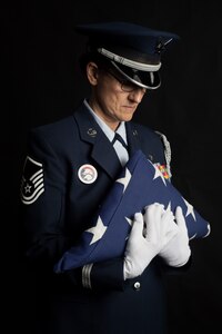 Master Sgt. Carmen LaGuardia poses for photos at Battle Creek Air National Guard Base, Mich., Feb. 5, 2023. LaGuardia is Michigan’s longest serving and most decorated honor guard member, having performed more than 2,000 military details.