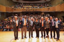 Special guests of the 2023 Manufacturing Expo and Exhibition at University of Texas Rio Grande Valley (UTRGV) in Edinburg give the UTRGV "V's Up," a single-hand sign representing the Vaqueros community, on Feb. 16, 2023. It is the same "v" sign used in American Sign Language, and represents the true spirit of the Vaqueros students, staff, faculty and the greater community. From left are: Dr. Can Saygin, Sr., UTRGV Vice President of Research; Dr. Archie L. Holmes Jr., Executive Vice Chancellor for Academic Affairs, UT system; Dr. Guy Bailey, UTRGV President; Honorable Heidi Shyu, Under Secretary of Defense for Research and Engineering; Dr. Ala Qubbaj, UTRGV Dean for the College of Engineering and Computer Science; Dr. Cindy Waters, Carderock SSTM for Advanced Manufacturing and Materials; Dr. James Li, Director of I-DREAM4D; and Louie Lopez, DoD STEM, Director. (Photo provided by Dr. Cynthia Waters)