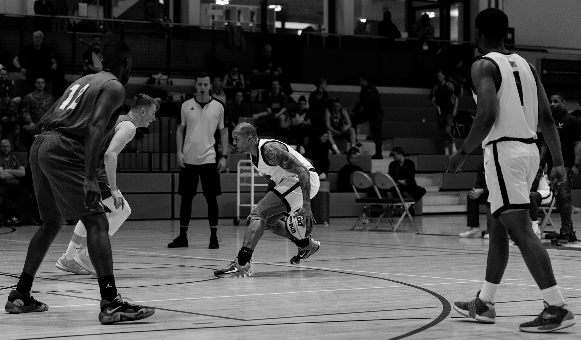 man dribbles a ball.