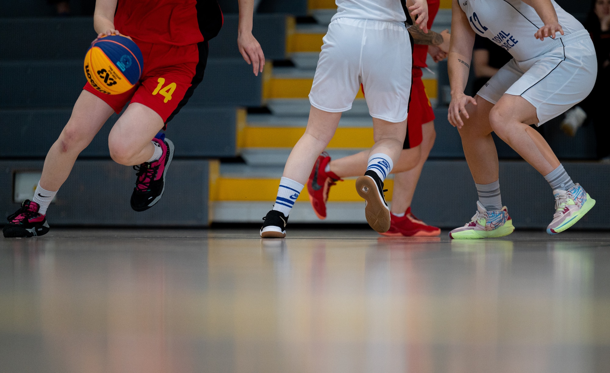 woman dribbles a ball
