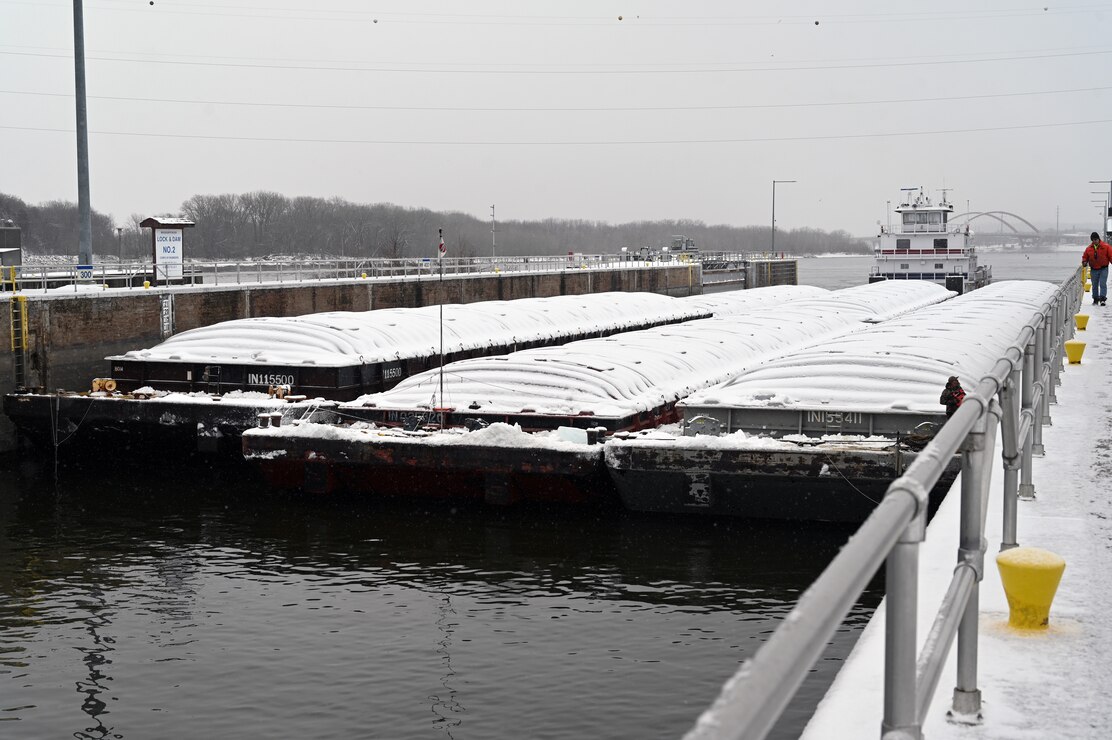 A tow boat navigates the Mississippi River.