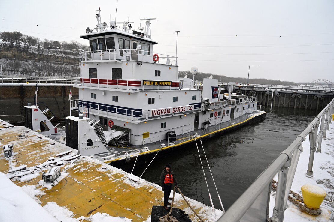 A tow boat navigates the Mississippi River.
