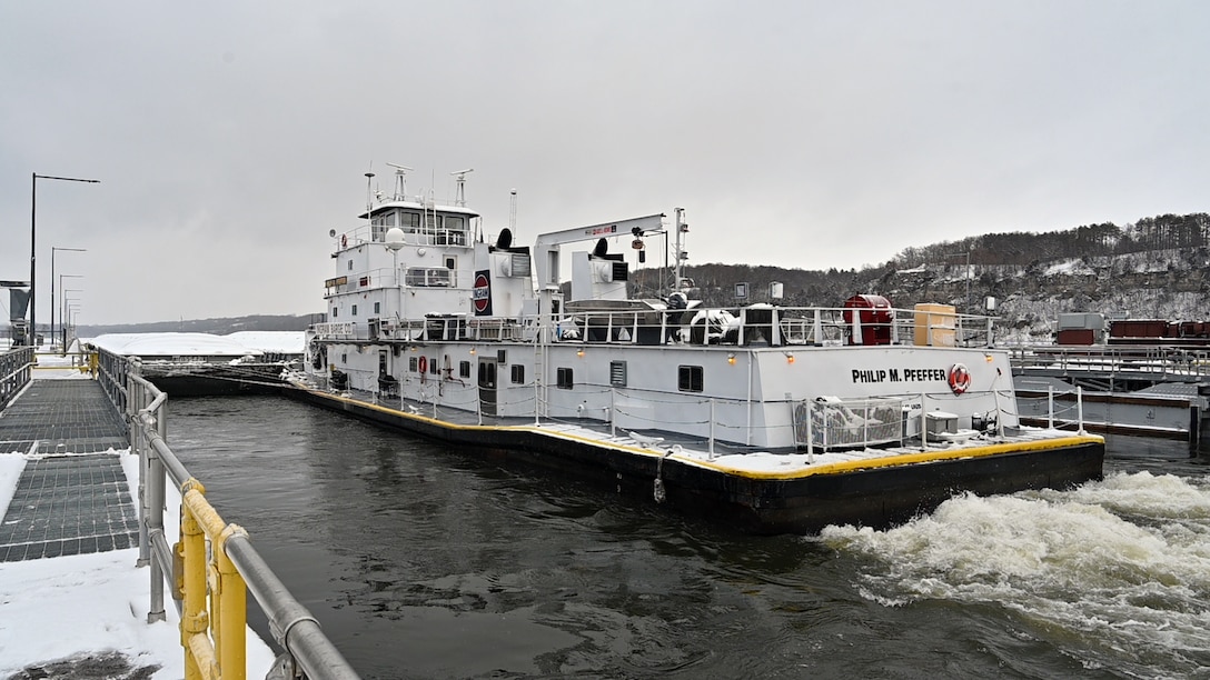 A tow boat navigates the Mississippi River.