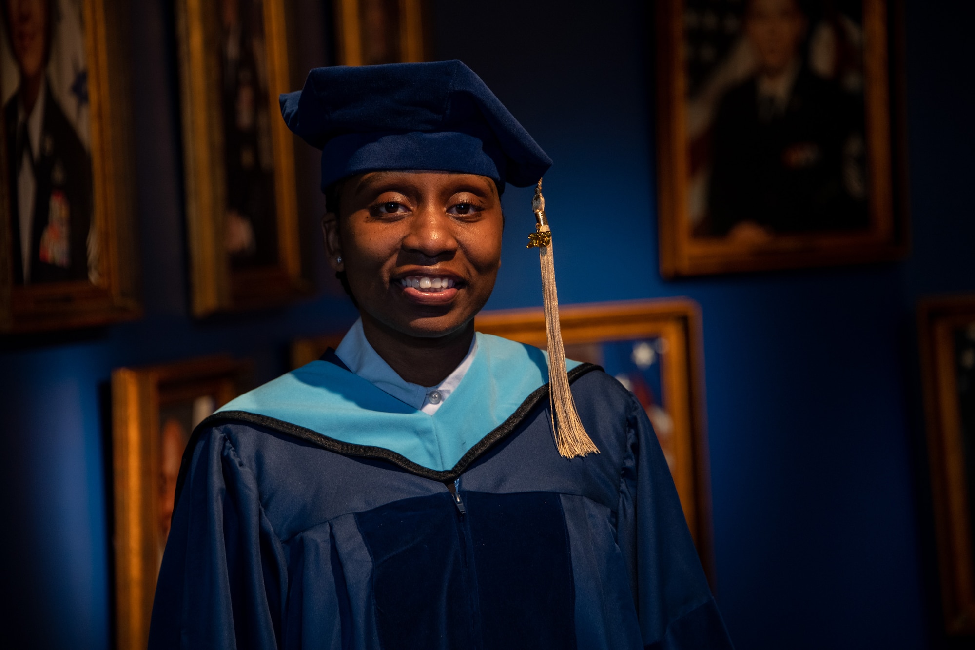 Senior Master Sgt. Anique S. McElveen received her doctorial hood during a ceremony at the Enlisted Heritage Hall on Maxwell Air Force Base, Gunter Annex, March 10, 2023. She is part of just .007 percent of enlisted Airmen to receive a doctoral degree. McElveen is the superintendent of the College of Academic Management at the Community College of the Air Force. (U.S. Air Force photo/Brian Ferguson)