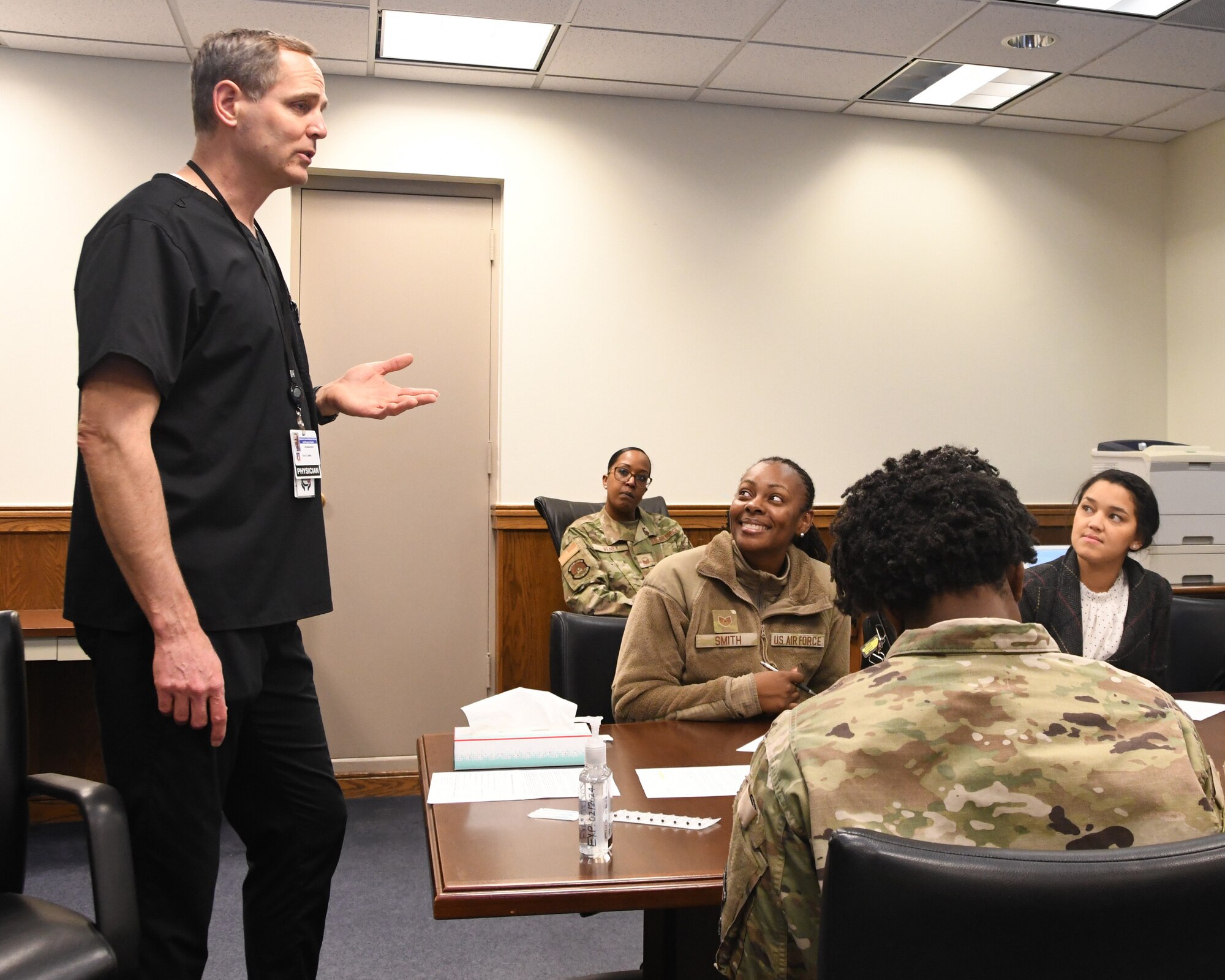 Dr. Tim Duffy, a former Air Force medical doctor, provides a briefing on stress and other health concerns during a free acupuncture session held at the 459th Air Refueling Wing headquarters building at Joint Base Andrews, Md., March 8, 2023. Dr. Duffy, the acupuncturist, was brought to the unit by the 459th Military and Family Readiness Office.