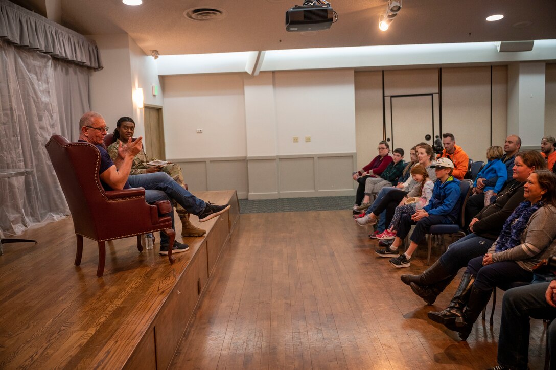 CMSgt. Denisha Ward-Swanigan, Command Chief Master Sergeant, 412th Test Wing emcees the Conversation with Celebrity Chef Robert Irvine event with base personnel at Edwards Air Force Base, California, March 10.