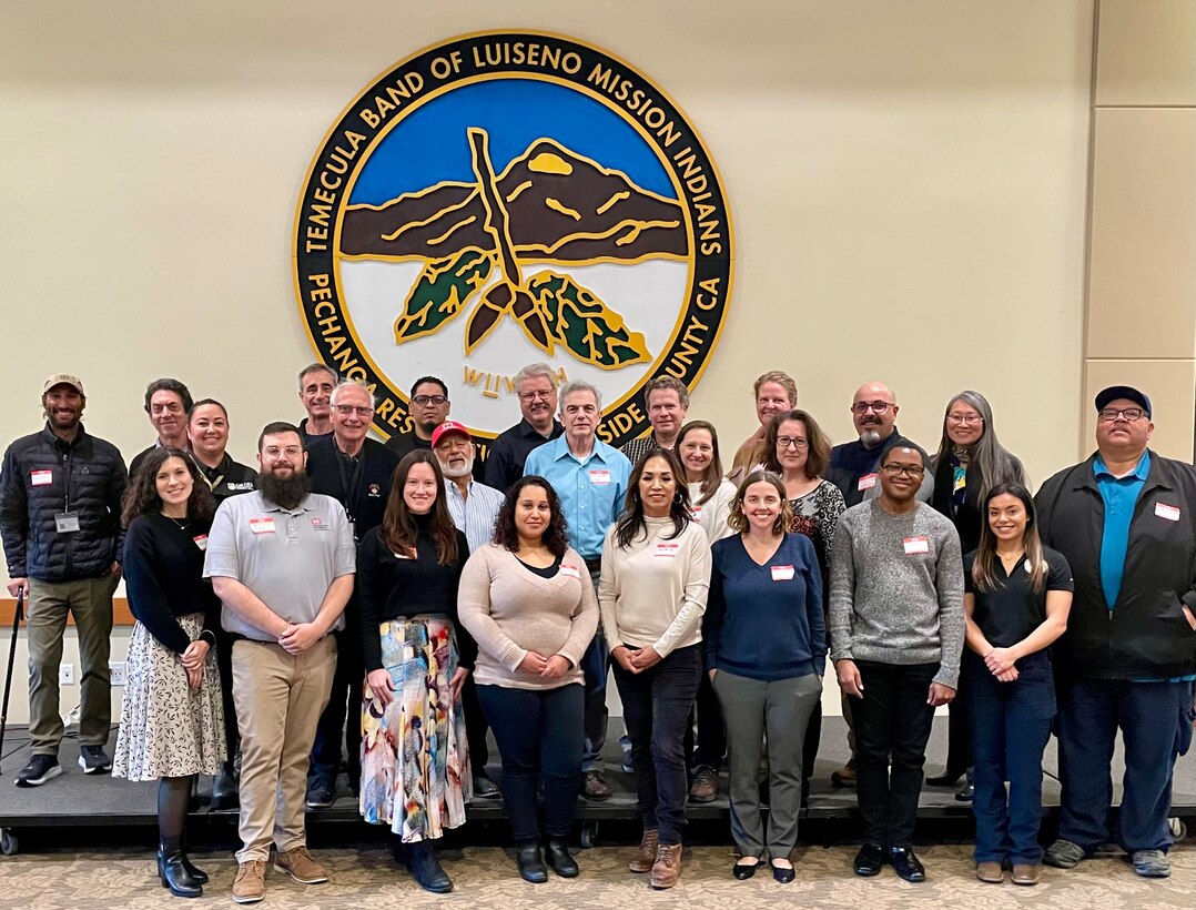 Tribal partners join local, state and federal agency representatives for a photo during the Southern California Post-Fire Mitigation, Recovery and Resilience Workshop for Tribes at the Pechanga Reservation near Temecula, California, Feb. 28, 2023. During the daylong workshop, the Corps teamed up with the agencies to share information about flood-fighting resources with tribal partners.
