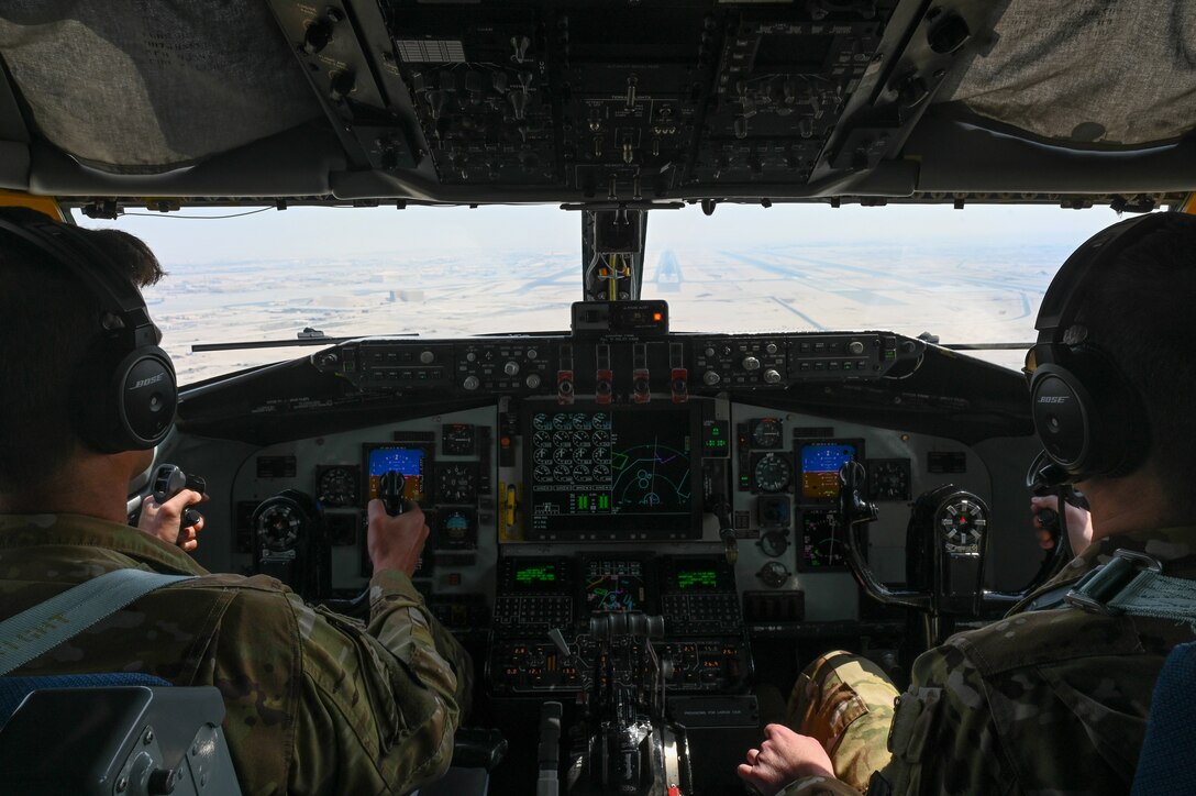 Lt. Col. James Stanford and Capt. Martin See, 91st Expeditionary Air Refueling Squadron pilots, prepare to land a KC-135 Stratotanker at Al Udeid Air Base, Qatar, after a Bomber Task Force mission, March 12, 2023. The short-notice, non-stop deployment underscores the U.S., and coalition force’s commitment to their regional partners, while validating the ability to rapidly deploy combat airpower anywhere in the world.  (U.S. Air Force photo by Tech. Sgt. Diana M. Cossaboom)