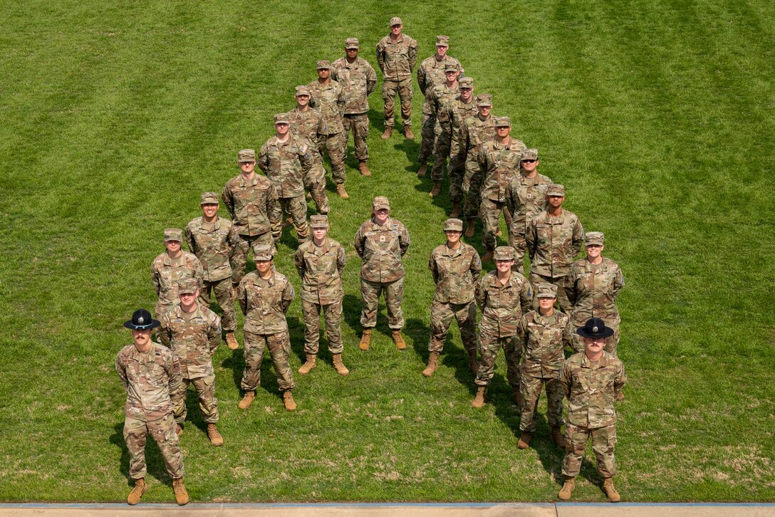 Space Force cadets and Air Force enlisted military training instructors at Officer Training School gather in a ‘delta’ formation on Welch Field, Maxwell Air Force Base, Alabama, March 7, 2023. One of the OTS flights from the last graduating class was an all-Space Force flight, with 15 Guardians being commissioned into the new force.