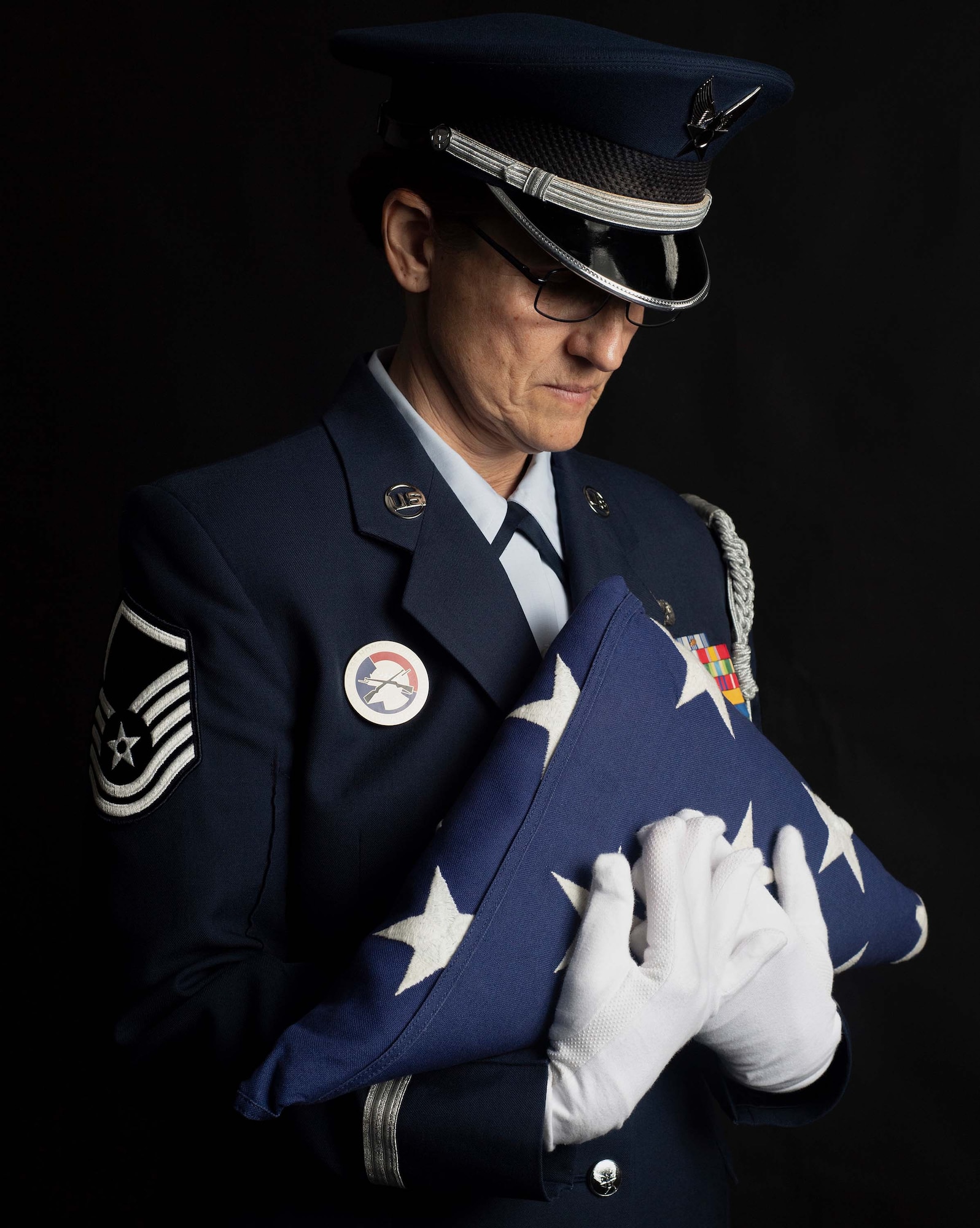 Master Sgt. Carmen LaGuardia poses for photos at Battle Creek Air National Guard Base, Mich., Feb. 5, 2023. LaGuardia is Michigan’s longest serving and most decorated honor guard member, having performed more than 2,000 military details.