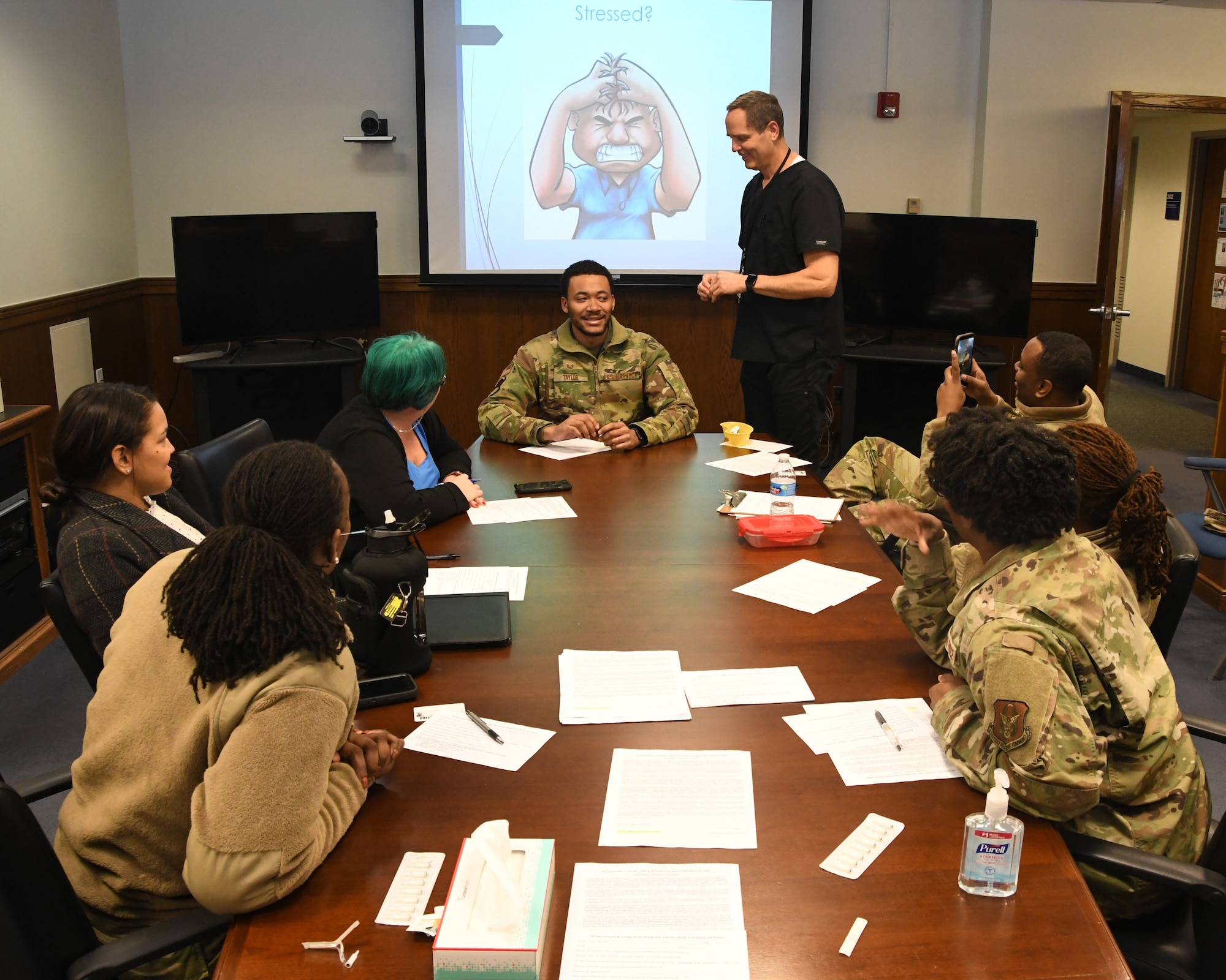 Dr. Tim Duffy, a former Air Force medical doctor, provides a briefing on stress and other health concerns during a free acupuncture session held at the 459th Air Refueling Wing headquarters building at Joint Base Andrews, Md., March 8, 2023. Dr. Duffy, the acupuncturist, was brought to the unit by the 459th Military and Family Readiness Office.