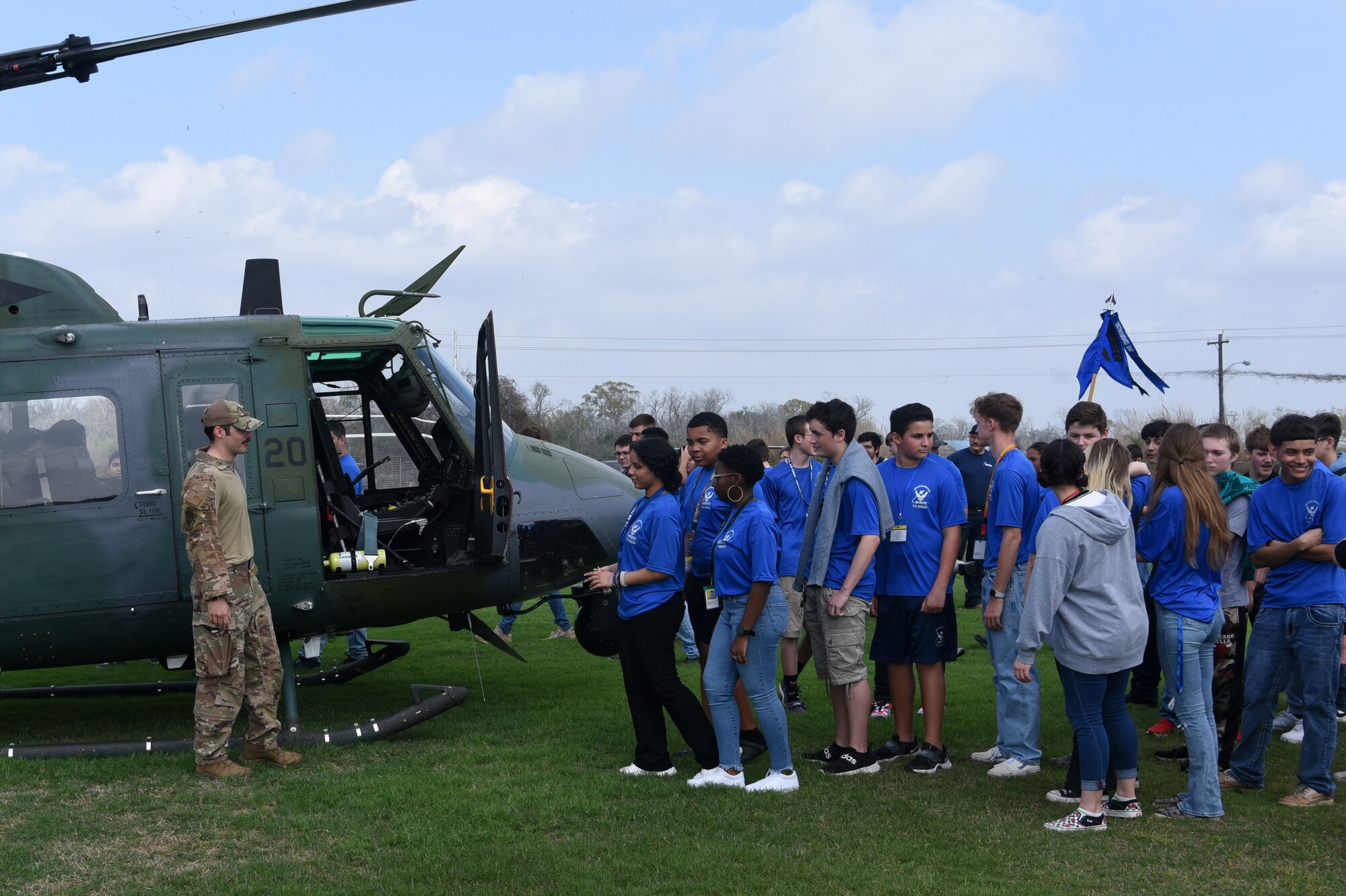 students line up to see inside helicopter