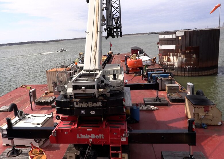 Nashville District Maintenance Support Team and Kentucky Lock Maintenance Engineers work from the Motor Vessel Iroquois March 8, 2023, to repair mooring cells located upstream of Kentucky Lock in Grand Rivers, Kentucky. (USACE Photo by Misty Cunningham)