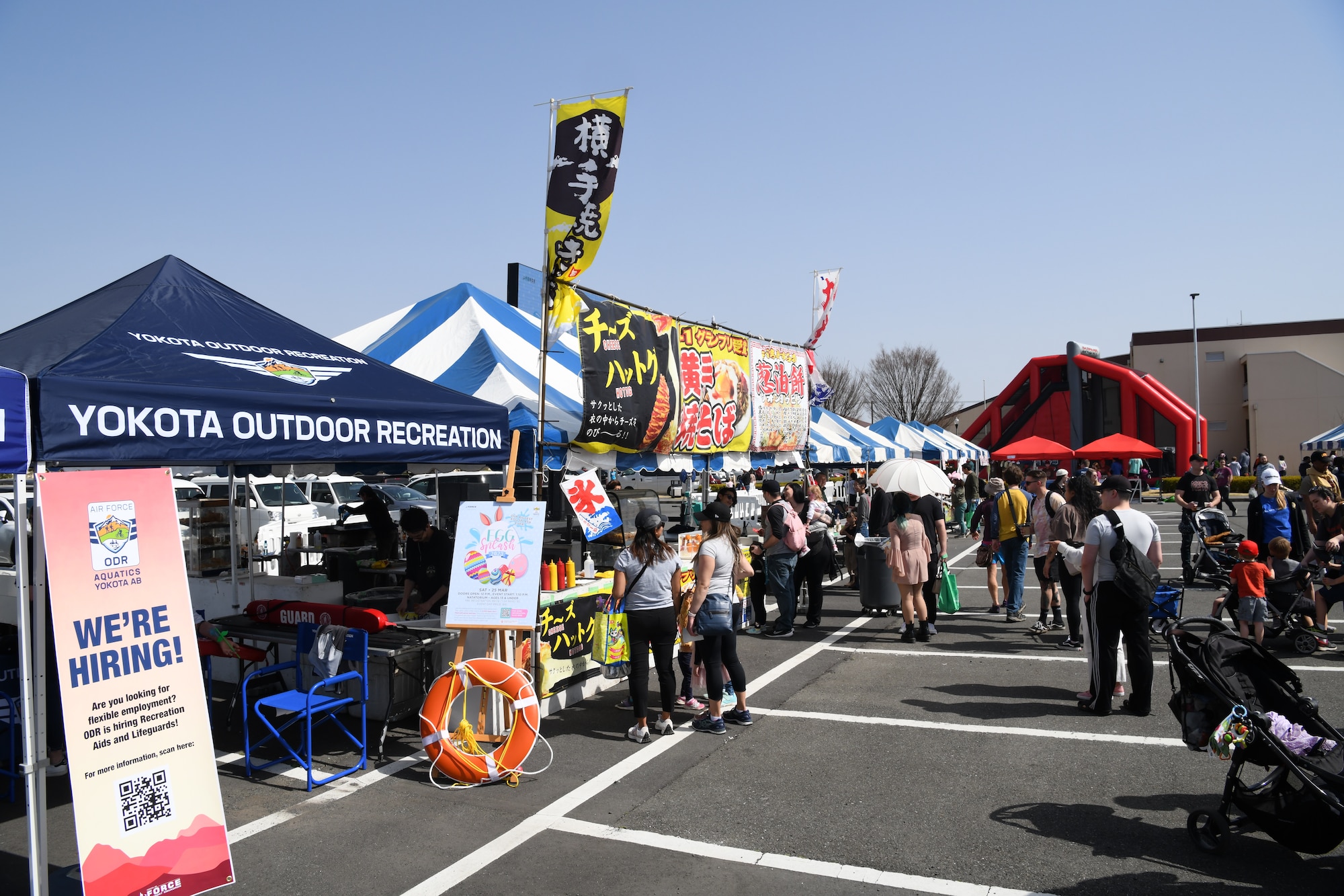 Vendor stalls are set up outside.