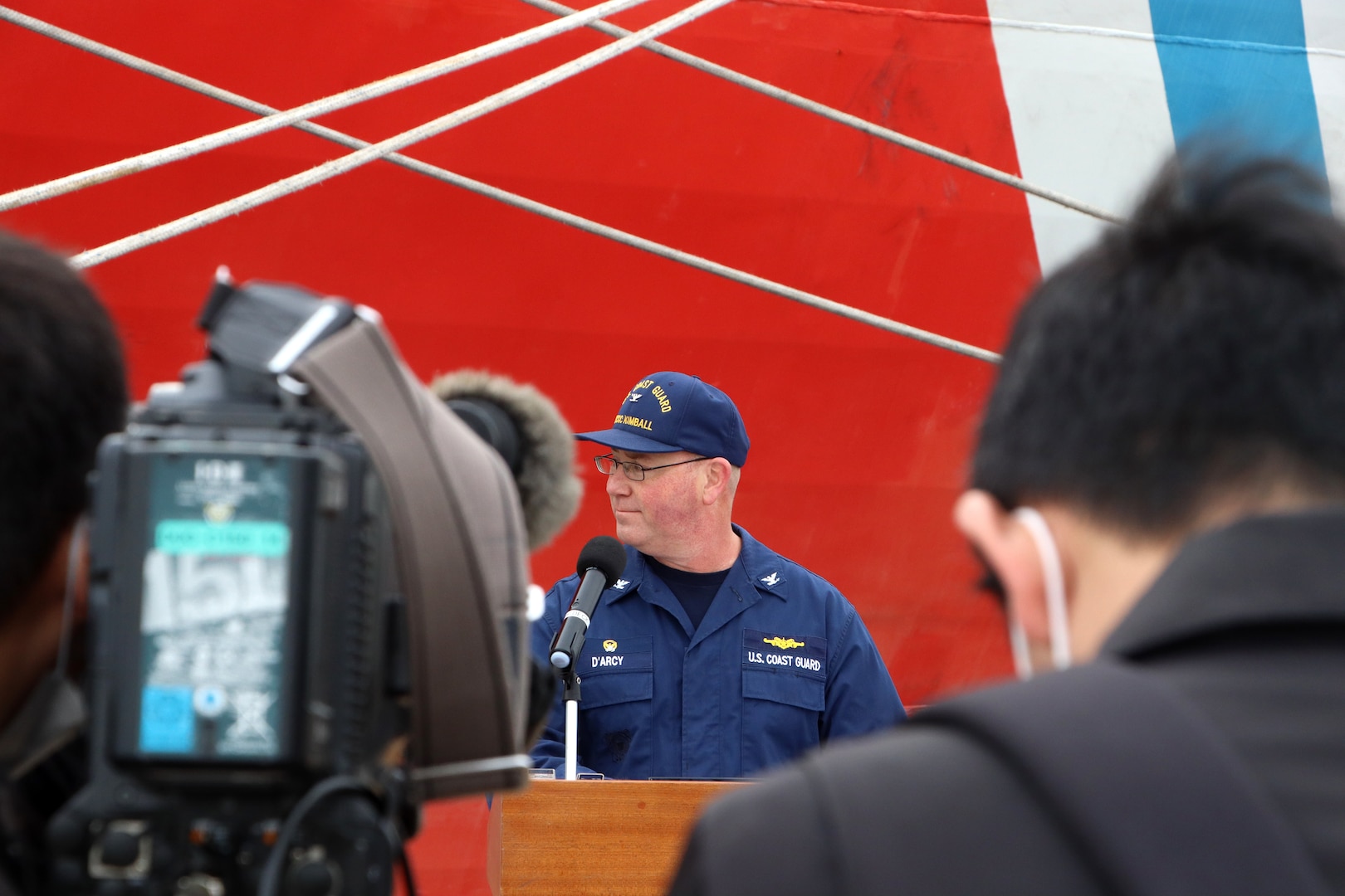 Capt. Thomas D’Arcy, Coast Guard Cutter Kimball’s (WMSL 756) commanding officer, conducts an interview with members of the media during an engagement in Kagoshima, Japan, during the cutter’s Western Pacific patrol, Feb. 10, 2023. Kimball was the first U.S. military ship in recent history to visit Kagoshima, during their patrol where the crew partnered with servicemembers from Japan Coast Guard’s 10th District to plan and conduct combined operations and search-and-rescue exercises. U.S. Coast Guard photo by Ens. Philip Rogers.