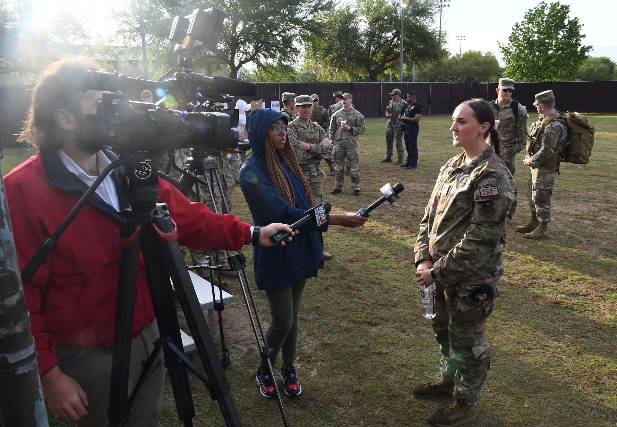 Local media interview U.S. Air Force Senior Airman Tessa Spare, 81st Security Forces Squadron military working dog handler, during the K-9 Veteran's Day Ruck & Demonstration at Keesler Air Force Base, Mississippi, March 13, 2023.