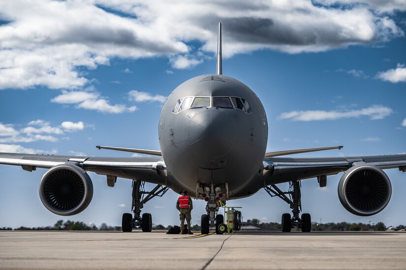 U.S. Air Force Airmen assigned to the 305th Air Mobility Wing conduct an Engine Running Crew Change (ERCC) during exercise White Stag at Joint Base McGuire-Dix-Lakehurst, N.J., March 8, 2023.