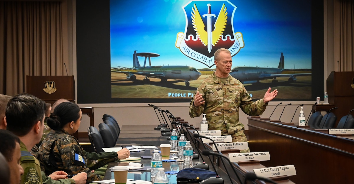 U.S. Air Force Gen. Mark Kelly briefs the ACC mission to international air attachés