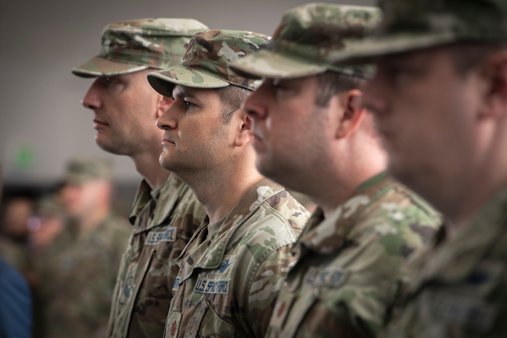 Four military members standing at attention