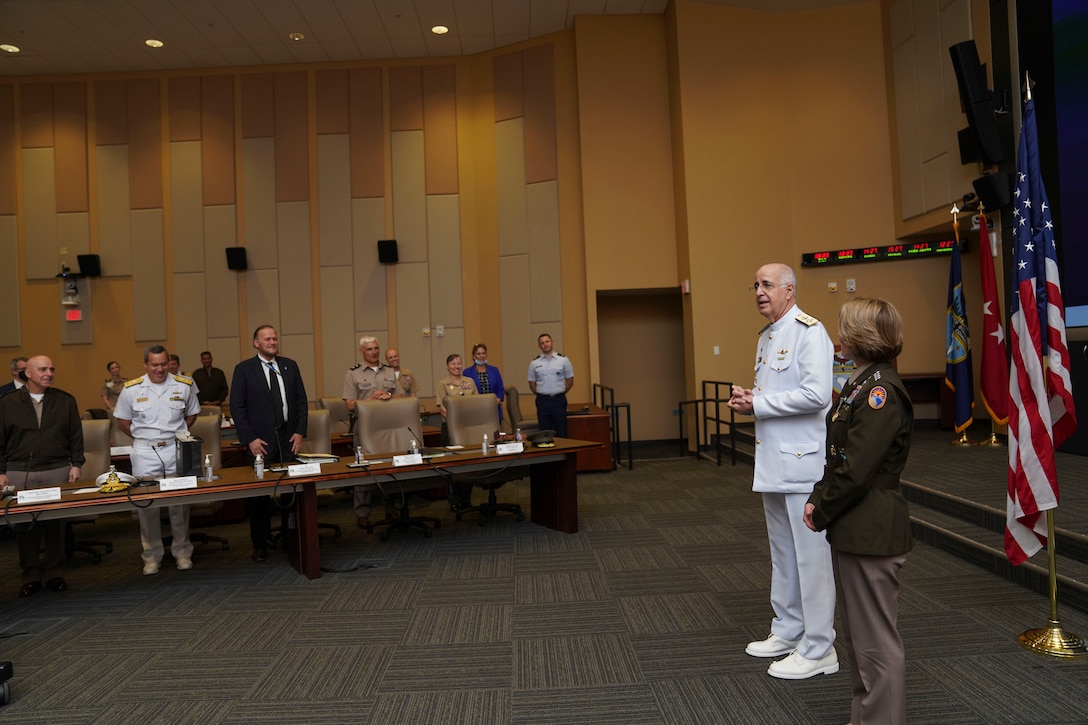 Brazil's Chief of the Joint Chiefs of Staff of the Armed Forces, Adm. Renato Rodrigues de Aguiar Freire, speaks to U.S. Army Gen. Laura Richardson.