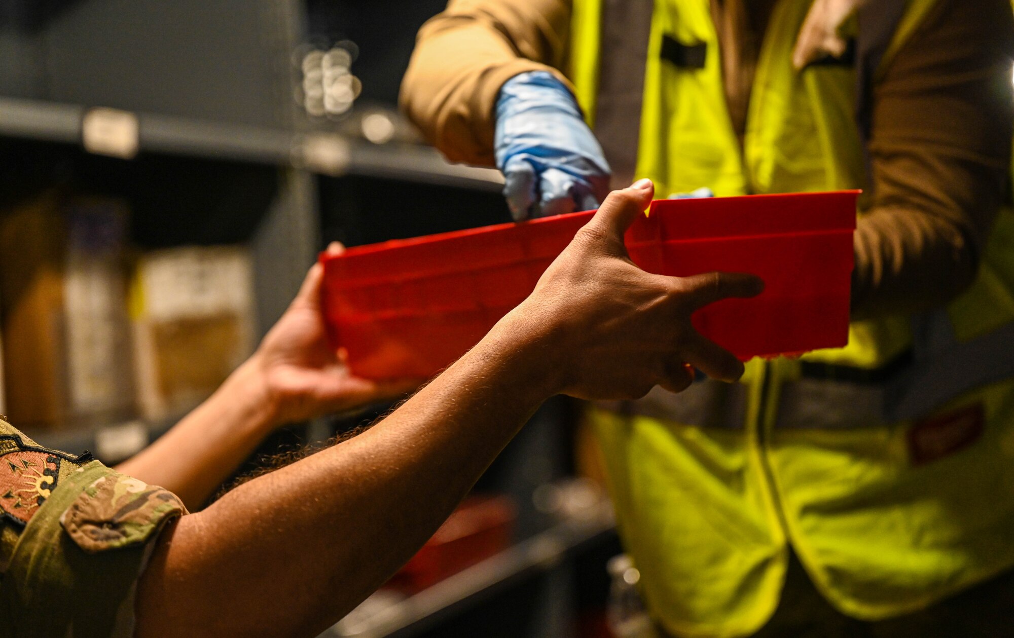 Airmen clear equipment from building 777 after a structural fire.