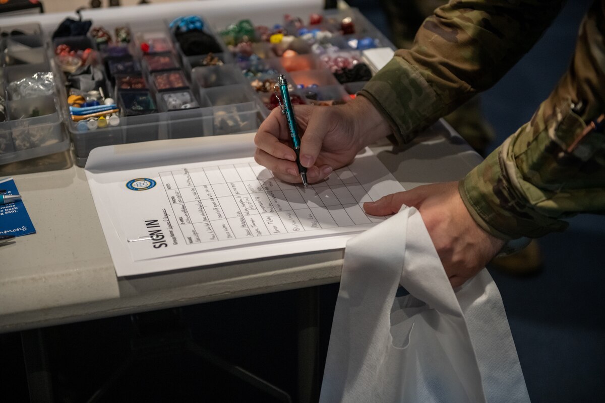 An Airman signs up for a club