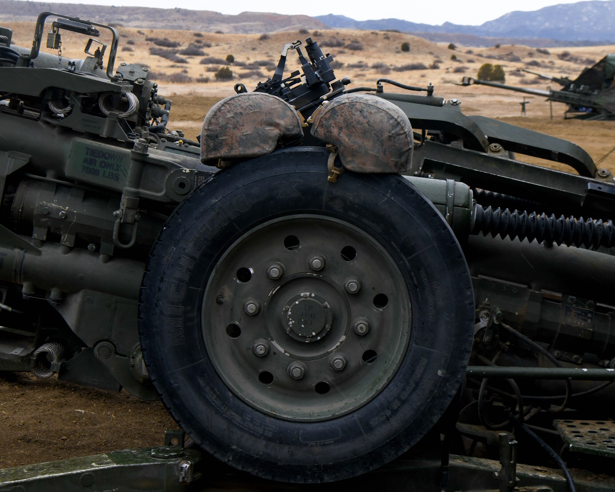 Service member fires a cannon