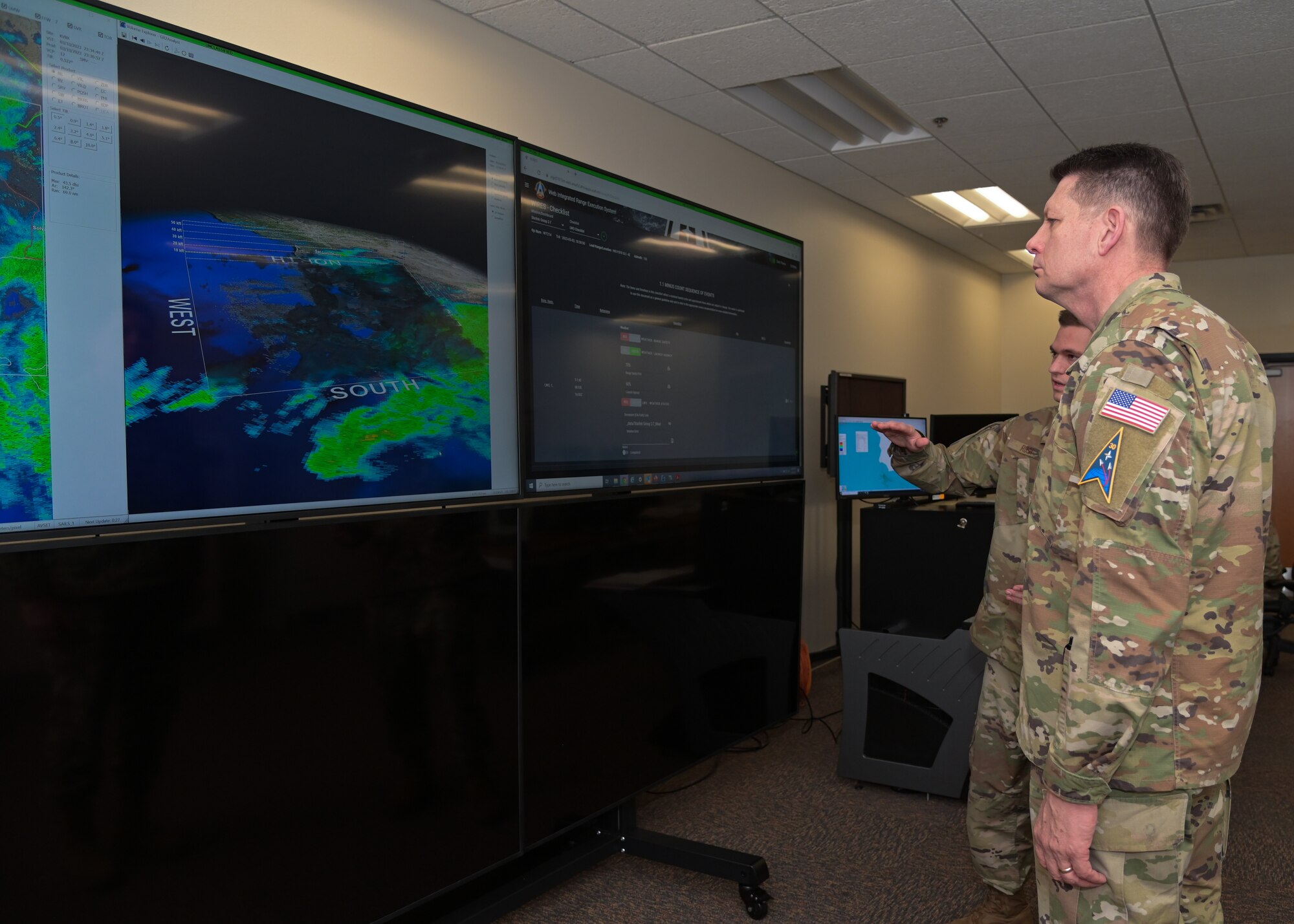 U.S. Space Force Gen. David D. Thompson, Vice Chief of Space Operations, received a briefing from U.S. Air Force Capt. Max Rush, 30th Operations Support Squadron launch weather commander, at the Western Range Operations Control Center, Vandenberg Space Force Base, Calif., March 10, 2023. (U.S. Space Force photo by Senior Airman Rocio Romo)