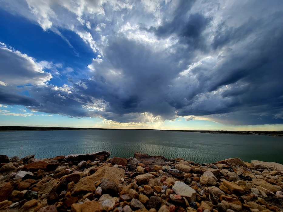 JOHN MARTIN DAM, Colo. – Sun rays reflect off John Martin Reservoir following a storm, Sept. 9, 2022. Photo by Holly Garnett.